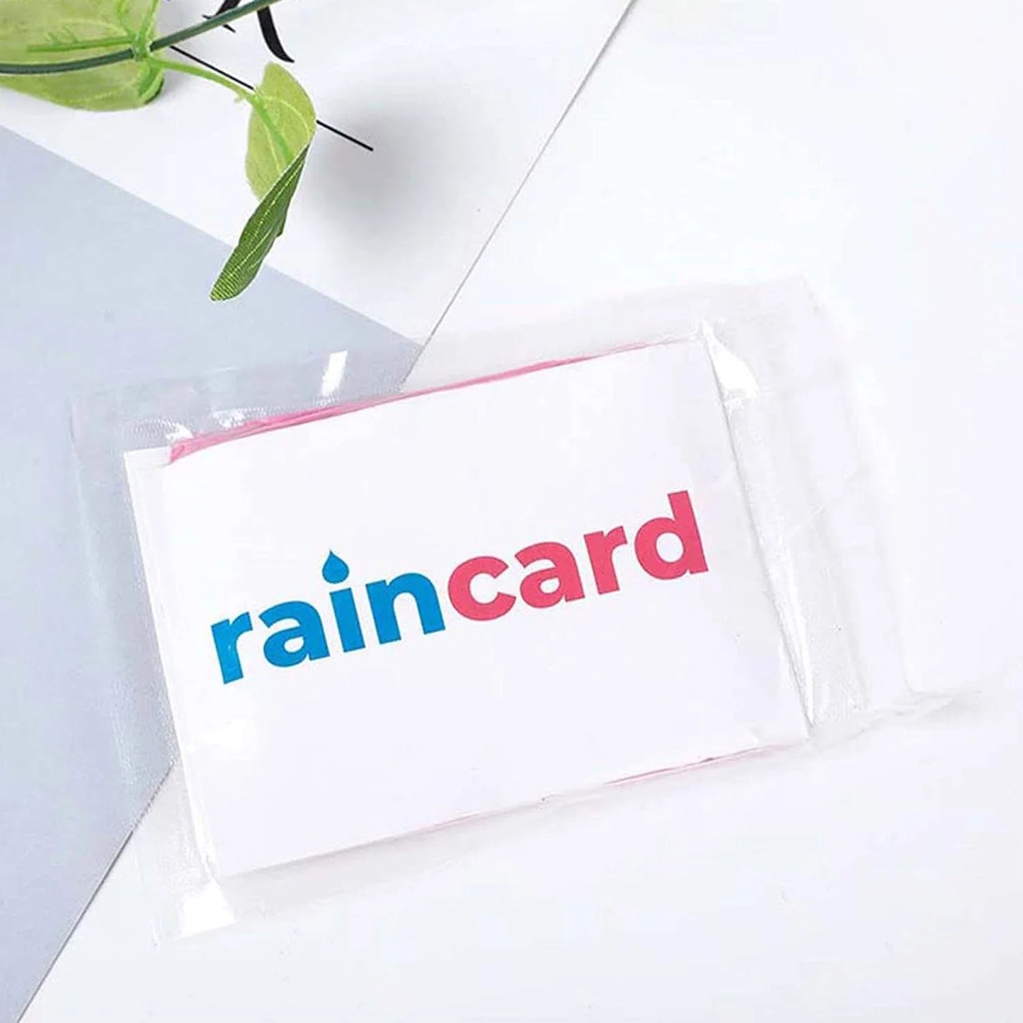 Rain Card - Rain? Flip. Wear. Go.